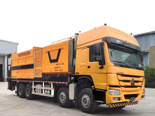 synchronous chip seal vehicle